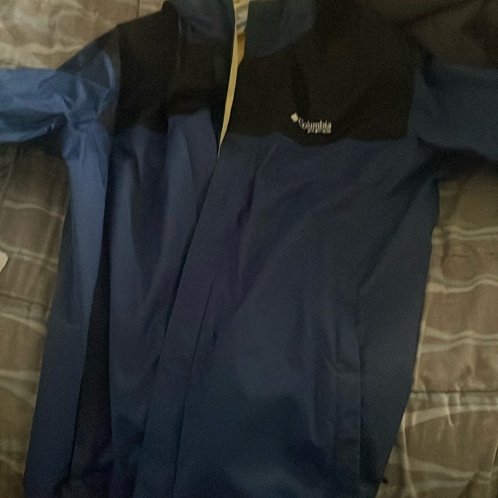 A Columbia rain coat size large